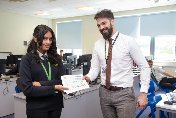 Teacher receiving a thank you card